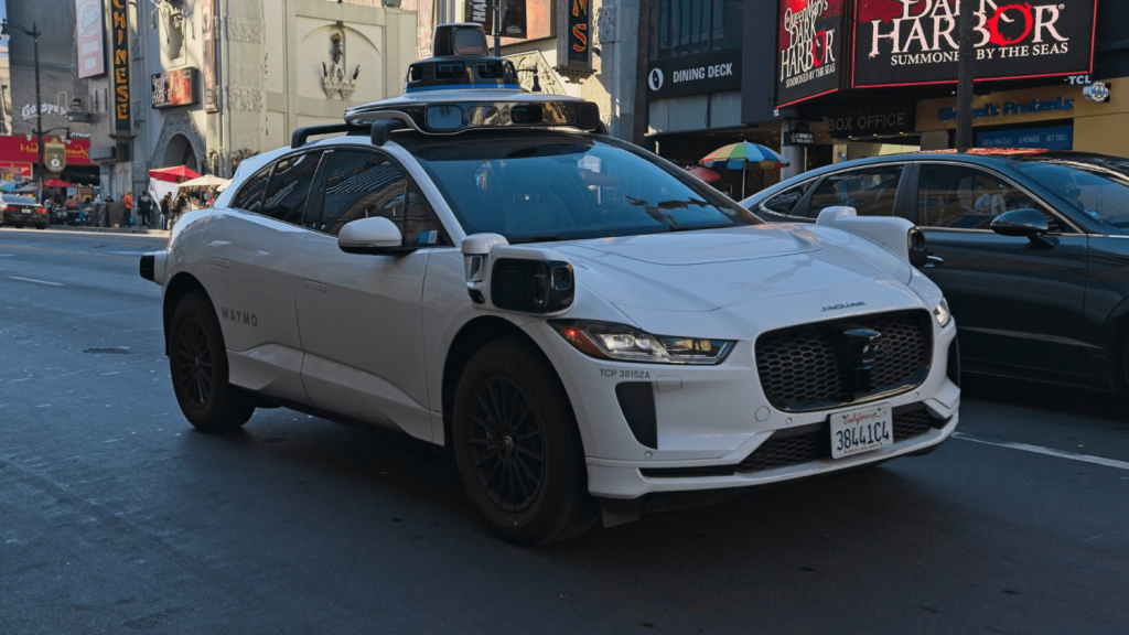 Waymo is seeking about $16 billion at a near $110 billion valuation as it expands robotaxi services amid growing safety scrutiny.