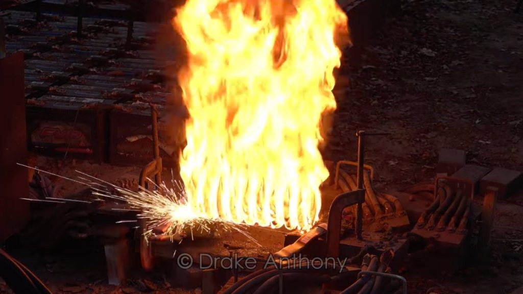 Watch the Electrical Current From 400 Car Batteries Torch a Suspension Spring